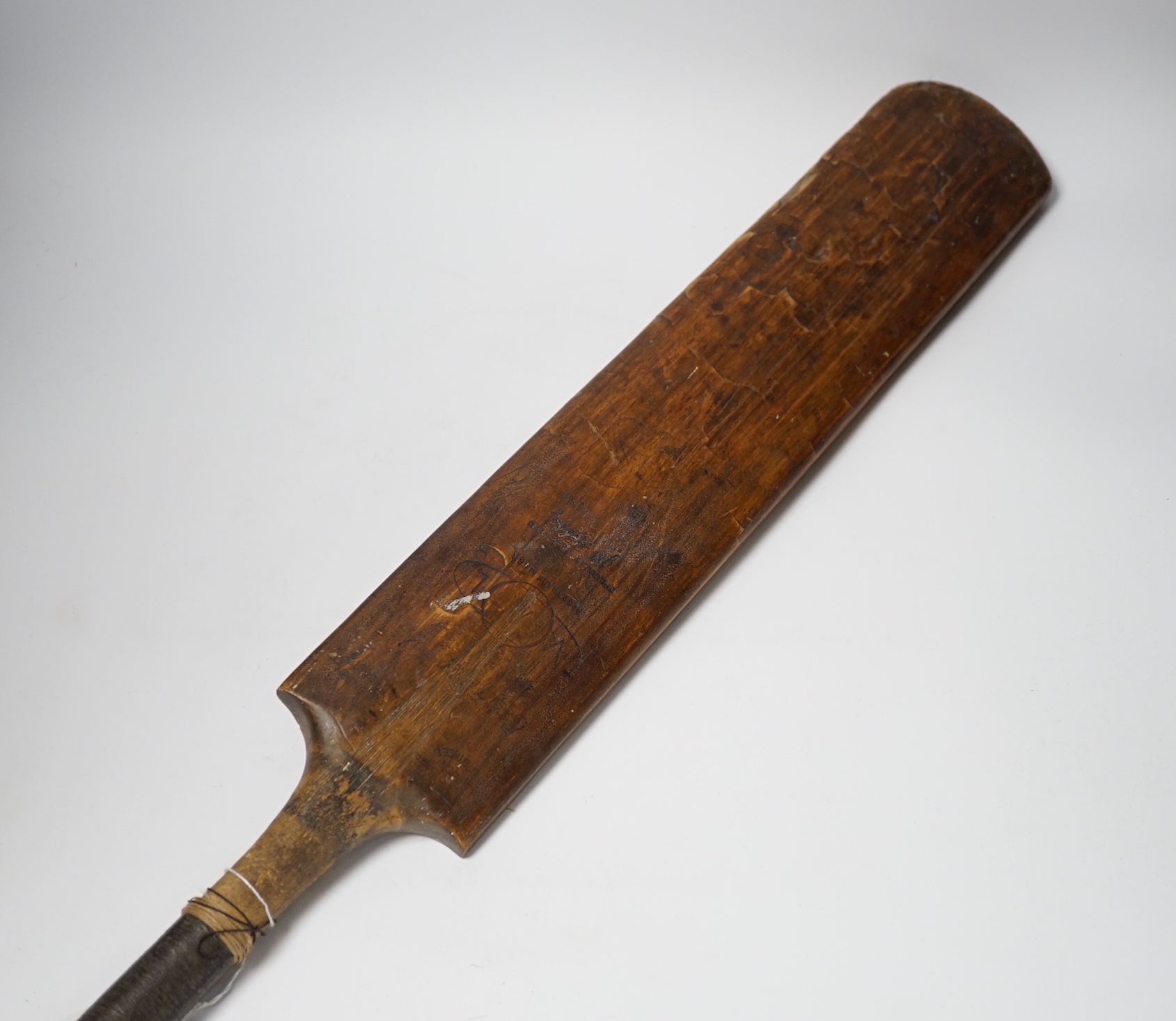 A Jack Hobbs related cricket bat and related hand written letter; the letter mentions the donation of the cricket bat to the Rev. E. H. Smith (photograph of Smith and his family also included), the letter is handwritten